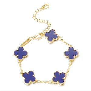 Blue four leaf clover gold tone bracelet